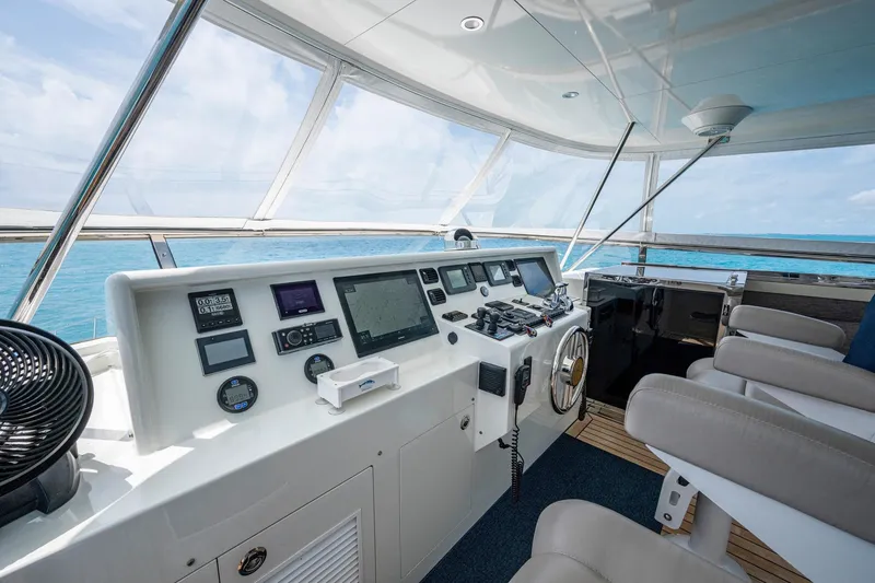 Slide: The Image of Helm of 2018 Cheoy Lee Bravo 78 Sport Motor Yacht with modern navigation equipment. - 16