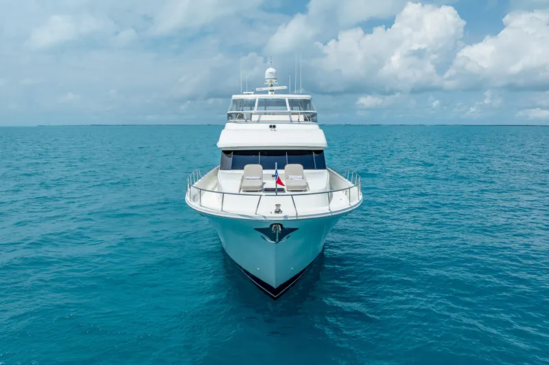 Slide: The Image of 2018 Cheoy Lee Bravo 78 Sport Motor Yacht on open sea under blue sky. - 2