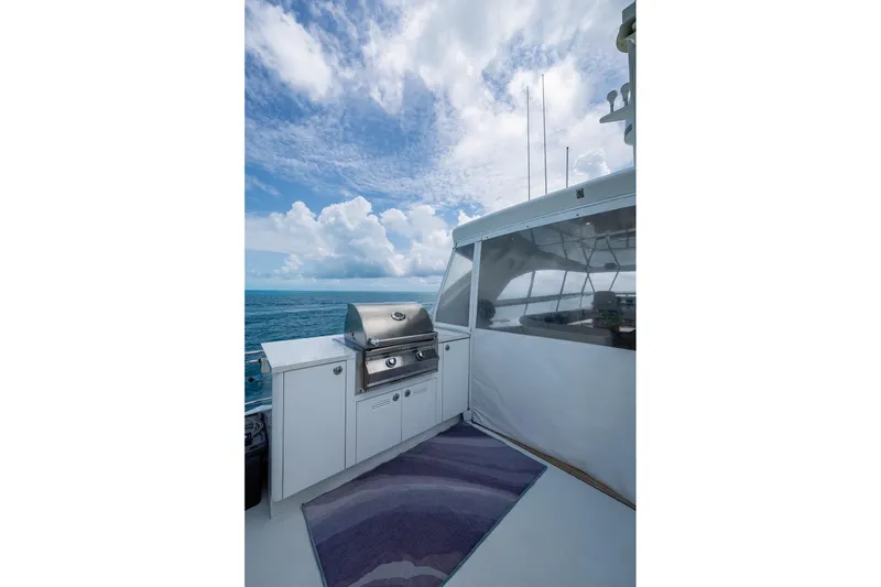 Slide: The Image of Outdoor grill area on 2018 Cheoy Lee Bravo 78 Sport Motor Yacht, with ocean view. - 22