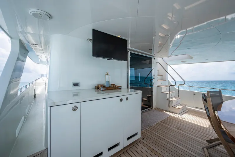 Slide: The Image of Luxurious 2018 Cheoy Lee Bravo 78 Sport Motor Yacht deck with modern amenities and ocean view. - 25