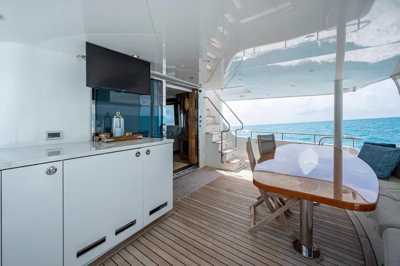 Slide: The Image of Luxurious 2018 Cheoy Lee Bravo 78 yacht deck with elegant seating and ocean view. - 27