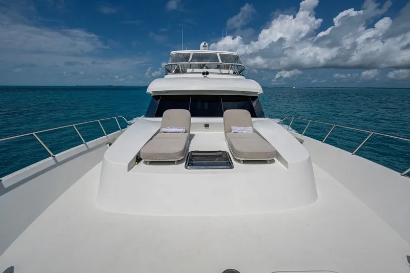 Slide: The Image of 2018 Cheoy Lee Bravo 78 Sport Motor Yacht on open sea with sun loungers. - 30