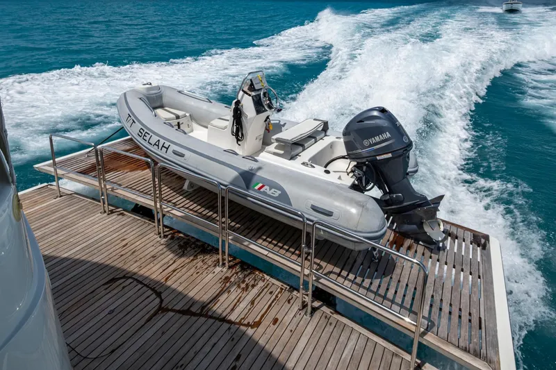 Slide: The Image of 2018 Cheoy Lee Bravo 78 Sport Motor Yacht with tender on deck, cruising in blue waters. - 35