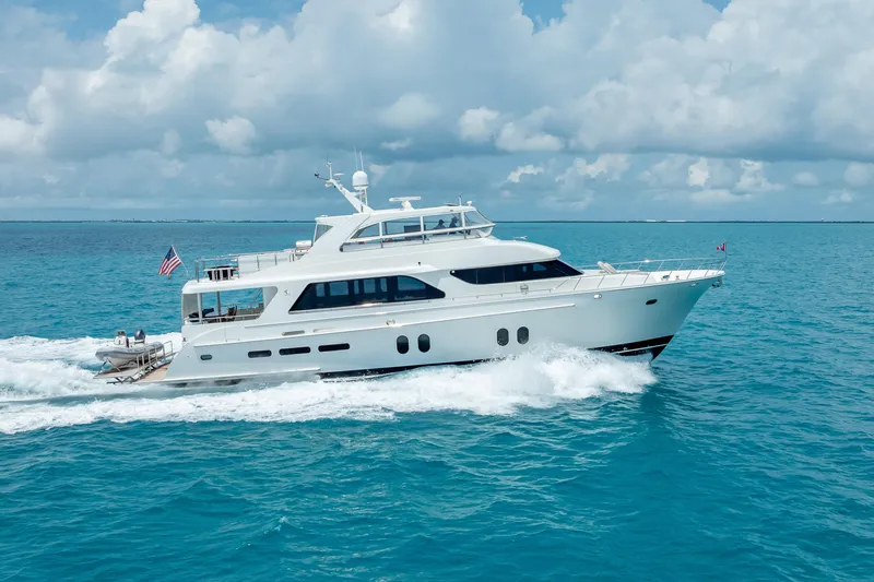 Slide: The Image of 2018 Cheoy Lee Bravo 78 Sport Motor Yacht cruising on open sea under cloudy sky. - 4