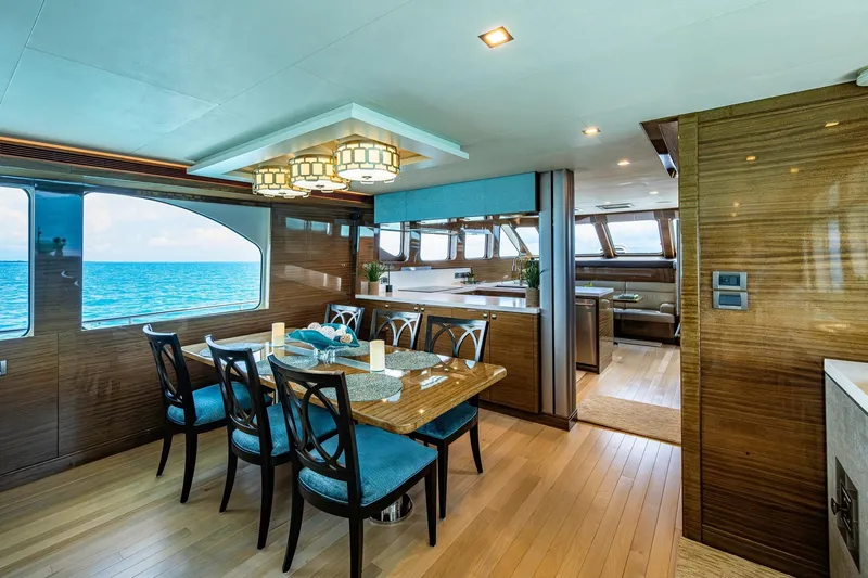 Slide: The Image of Luxurious interior of 2018 Cheoy Lee Bravo 78 Sport Motor Yacht with ocean view dining area. - 44