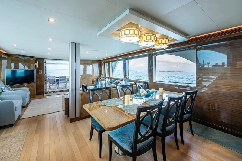 Slide: The Image of Luxurious interior of 2018 Cheoy Lee Bravo 78 Sport Motor Yacht with ocean view dining area. - 47