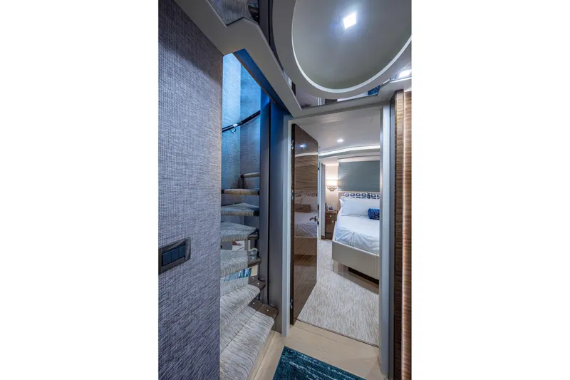 Slide: The Image of Luxurious interior of 2018 Cheoy Lee Bravo 78 Sport Motor Yacht, featuring elegant staircase and bedroom. - 67