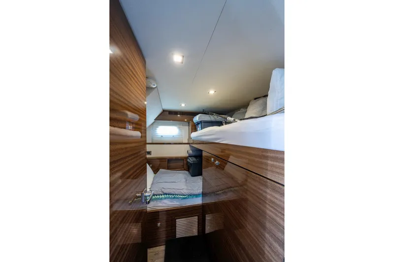 Slide: The Image of Interior cabin of 2018 Cheoy Lee Bravo 78 Sport Motor Yacht with wooden finishes. - 82