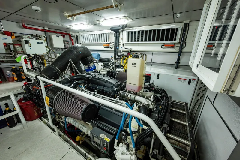 Slide: The Image of Engine room of 2018 Cheoy Lee Bravo 78 Sport Motor Yacht, featuring advanced machinery. - 86