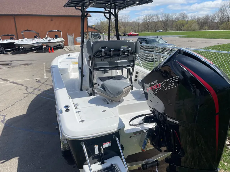 Slide: The Image of 2023 NauticStar 227 Bay boat with Mercury Pro XS engine. - 11