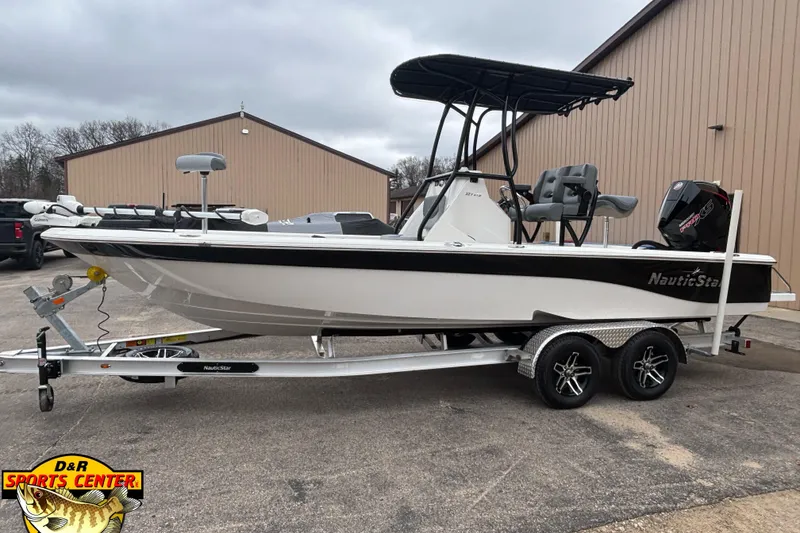 Slide: The Image of 2023 NauticStar 227 Bay boat on trailer at D&R Sports Center. - 23