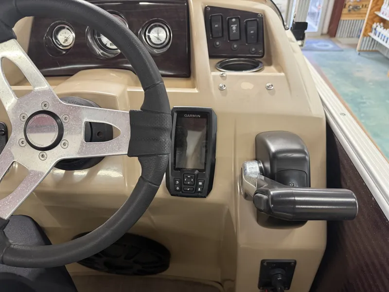 Slide: The Image of Steering console of a 2016 Bennington 20SLX boat. - 20