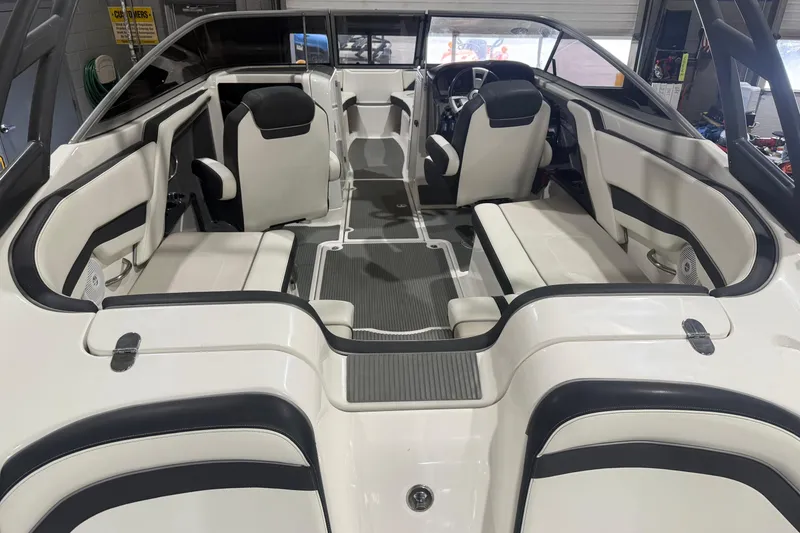 Slide: The Image of 2015 Yamaha Boats AR240 HO interior with sleek seating and modern design. - 2
