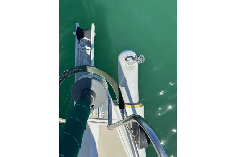 Slide: The Image of Close-up of a 1996 J Boats J/120 sailboat's bow and anchor mechanism. - 16