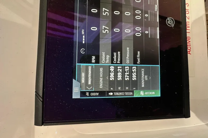 Slide: The Image of Display screen of a 2020 Intrepid 475 Sport Yacht showing engine maintenance data. - 15