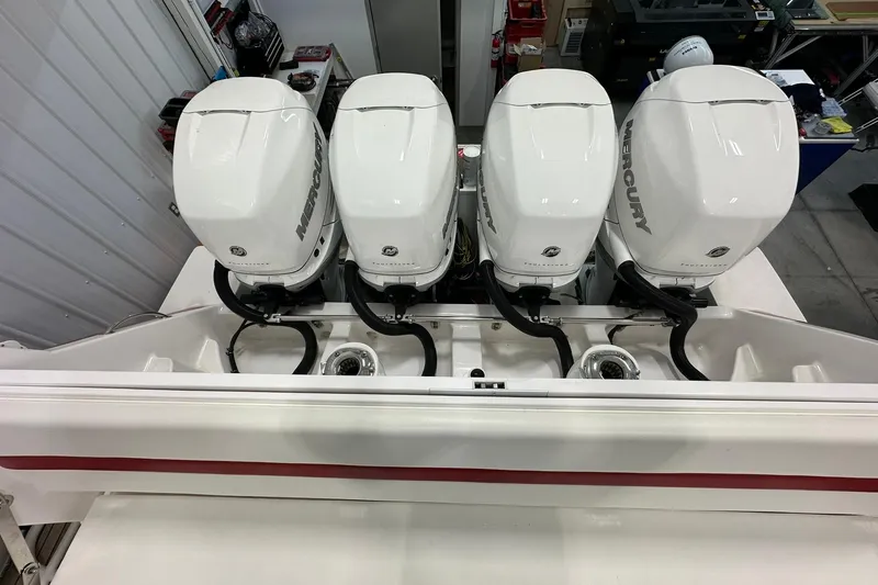 Slide: The Image of Four Mercury outboard engines on a 2020 Intrepid 475 Sport Yacht. - 34