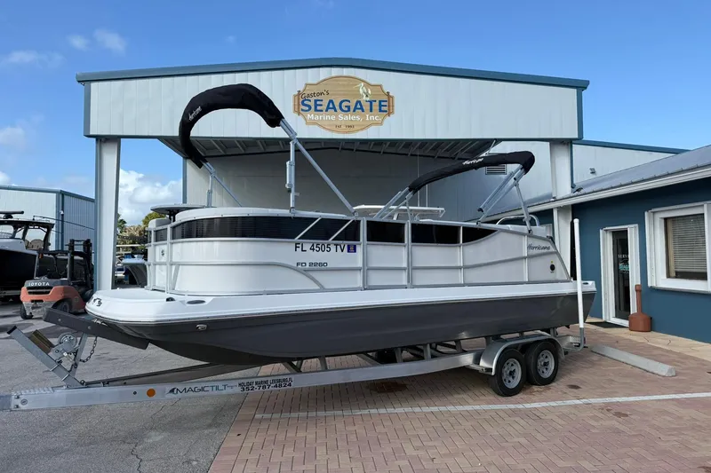 The Image of 2024 Hurricane FunDeck 2260 RE OB boat on trailer at Seagate Marine Sales. - 0