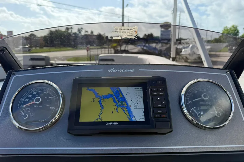 Slide: The Image of Dashboard of 2024 Hurricane FunDeck 2260 RE OB with Garmin navigation system. - 15