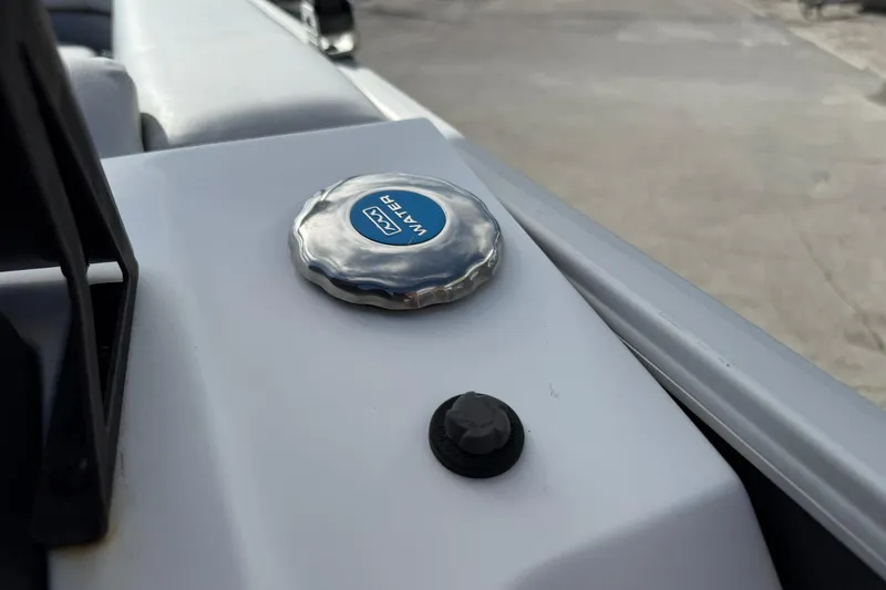 Slide: The Image of Water cap on 2024 Hurricane FunDeck 2260 RE OB boat deck. - 20