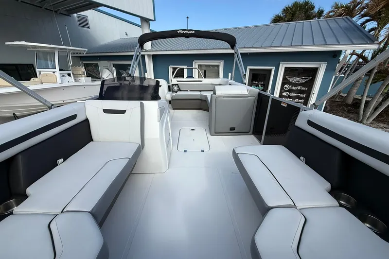 Slide: The Image of 2024 Hurricane FunDeck 2260 RE OB boat interior with spacious seating and modern design. - 30