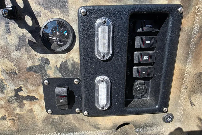 Slide: The Image of Control panel of Excel 1854 F4, featuring fuel gauge and switches, 2026 model. - 19