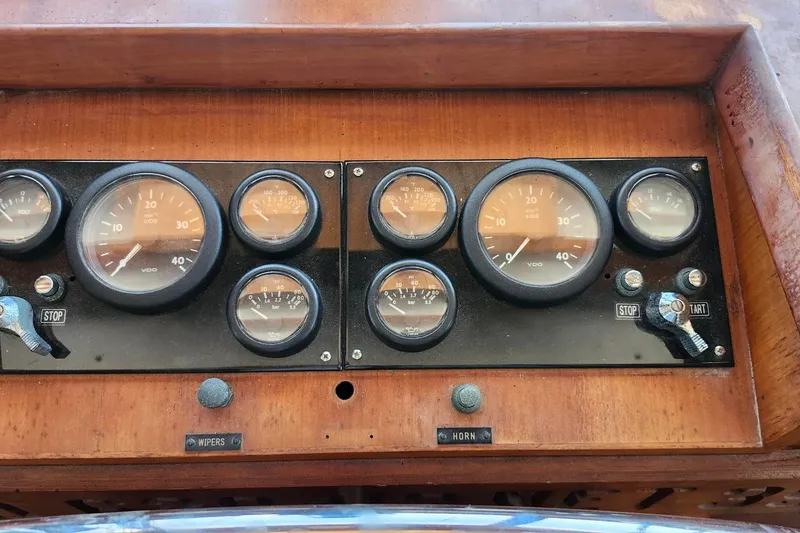 Slide: The Image of 1979 Marine Trader 50 Trawler dashboard with gauges and controls. - 15