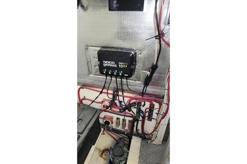 Slide: The Image of Electrical system of a 1979 Marine Trader 50 Trawler with NOCO Genius GENPRO10X4 charger. - 32