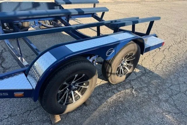 Slide: The Image of 2024 Crownline 240 SS boat trailer with dual axles and diamond plate fenders. - 3