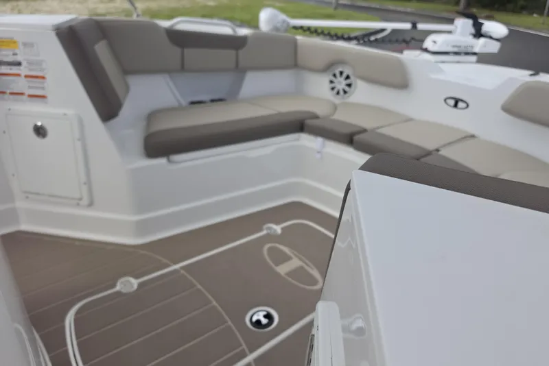Slide: The Image of Interior of 2026 Tahoe 2150 CC boat with cushioned seating and modern design. - 16