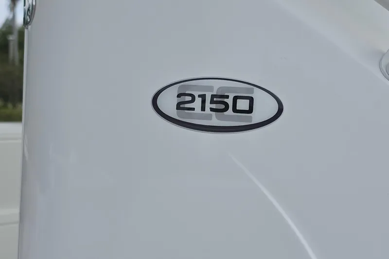 Slide: The Image of 2026 Tahoe 2150 CC boat logo on white surface. - 2
