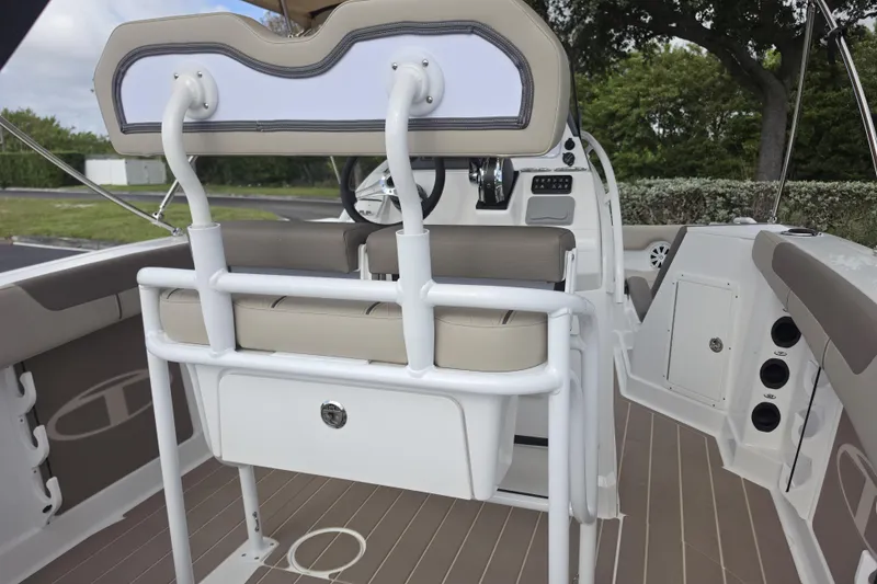 Slide: The Image of Interior view of 2026 Tahoe 2150 CC boat, featuring seating and control panel. - 3