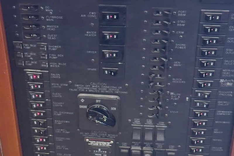 Slide: The Image of Electrical control panel on a 1997 Ocean Yachts 48 Super Sport boat. - 6