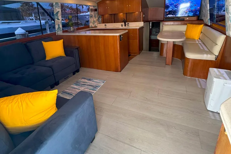 Slide: The Image of Luxurious interior of 1997 Ocean Yachts 48 Super Sport with modern furnishings and vibrant decor. - 8