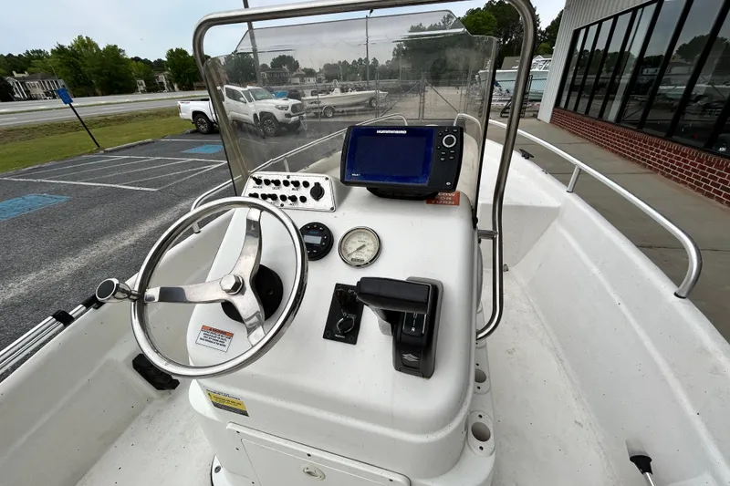 Slide: The Image of 2019 Cape Craft 160cc boat console with steering wheel and navigation system. - 7