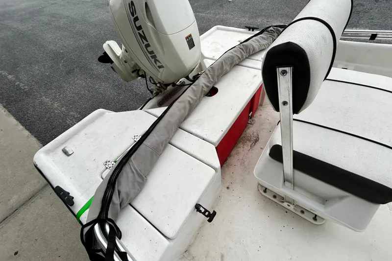 Slide: The Image of 2019 Cape Craft 160cc boat with Suzuki outboard motor and cushioned seating. - 8