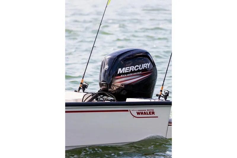 Slide: The Image of Manufacturer Provided Image: 2026 Boston Whaler 170 Montauk with Mercury outboard engine on water. - 8