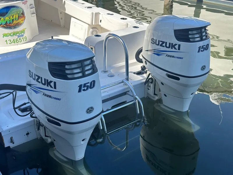 Slide: The Image of Twin Vee 26 GF 2017 boat with dual Suzuki 150 outboard motors. - 12