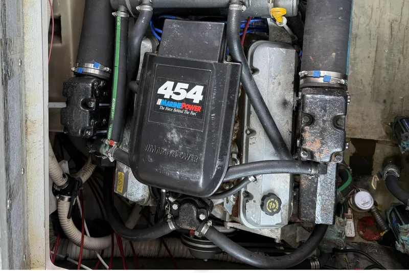 Slide: The Image of Engine compartment of a 1989 Tiara Yachts 3100 Flybridge with Marine Power 454 engine. - 41