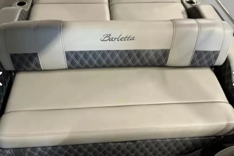 Slide: The Image of Barletta L23UC 2021 boat seat with elegant beige and gray upholstery design. - 21