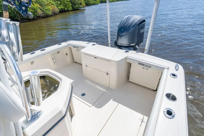 Slide: The Image of Manufacturer Provided Image: 2024 Pathfinder 2400 Open boat with Yamaha outboard motor on calm water. - 5