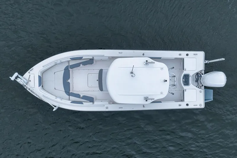 Slide: The Image of Top view of 2018 Everglades 243 Center Console boat on water. - 16