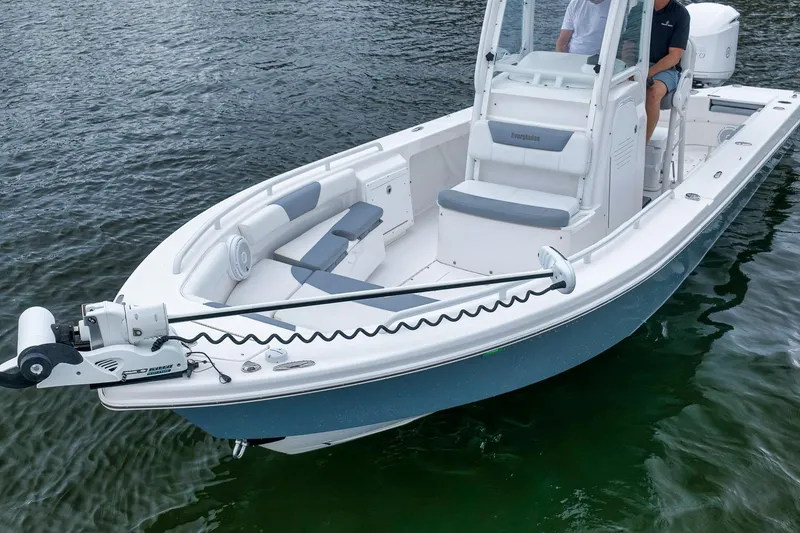 Slide: The Image of 2018 Everglades 243 Center Console boat on water, featuring sleek design and modern amenities. - 3