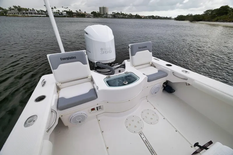 Slide: The Image of 2018 Everglades 243 Center Console boat with Yamaha 300 engine on calm water. - 30