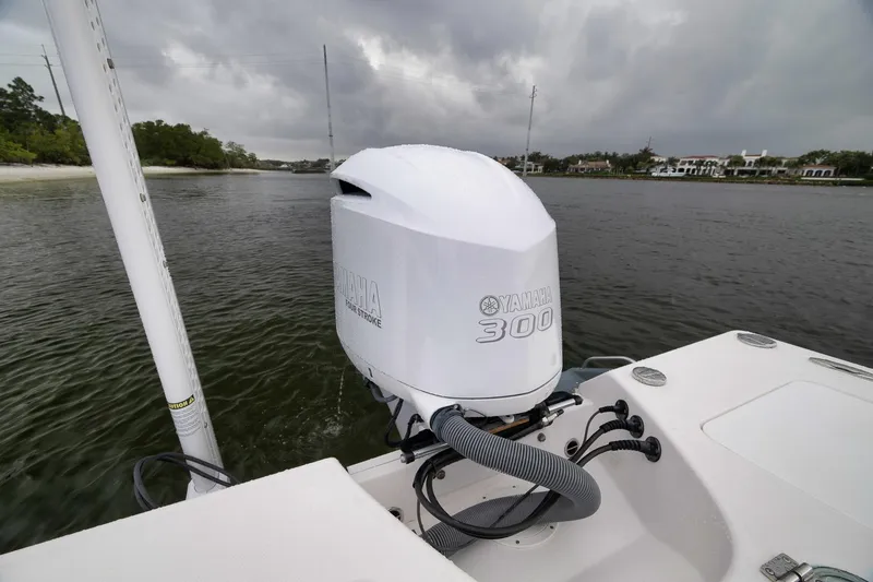 Slide: The Image of 2018 Everglades 243 Center Console with Yamaha 300 outboard motor on a cloudy day. - 34
