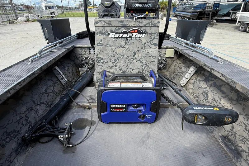 Slide: The Image of 2018 Gator Tail Extreme Series 2060cc boat interior with Yamaha generator and Minn Kota trolling motor. - 10