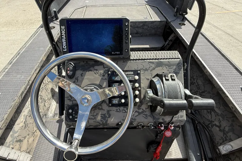 Slide: The Image of 2018 Gator Tail Extreme Series 2060cc boat console with steering wheel and Lowrance display. - 12