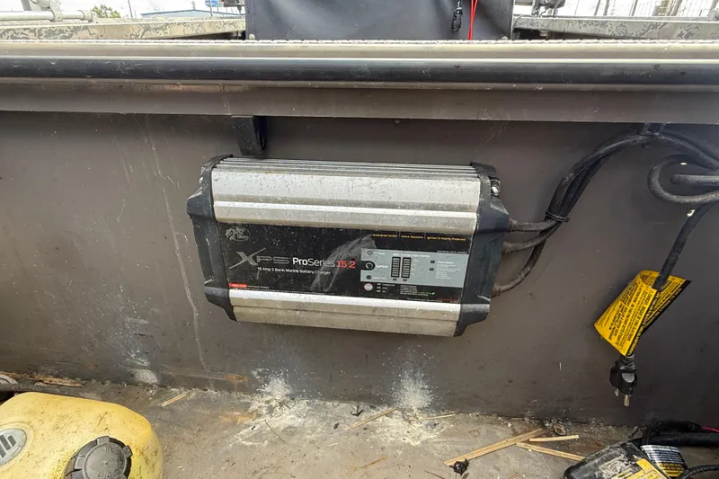 Slide: The Image of Battery charger installed on 2018 Gator Tail Extreme Series 2060cc boat interior. - 14