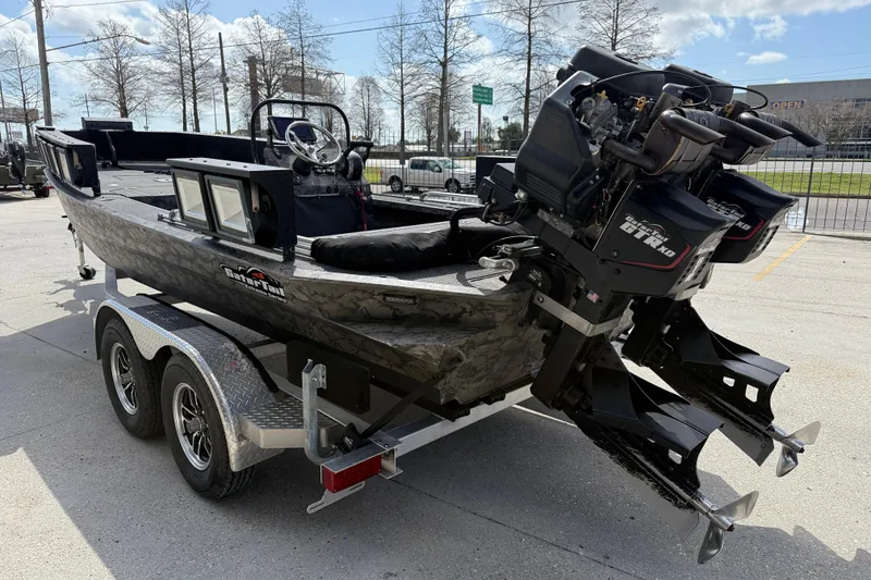 Slide: The Image of 2018 Gator Tail Extreme Series 2060cc boat on trailer with dual motors. - 4