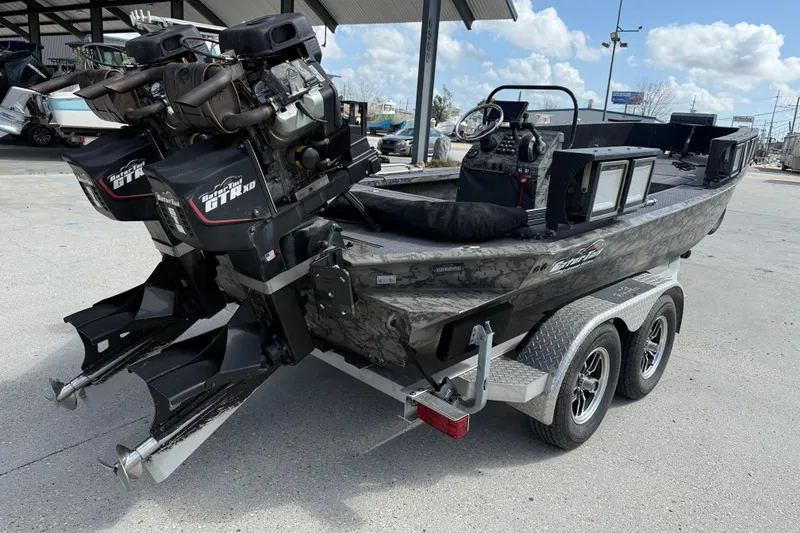 Slide: The Image of 2018 Gator Tail Extreme Series 2060cc boat with dual engines on a trailer. - 6