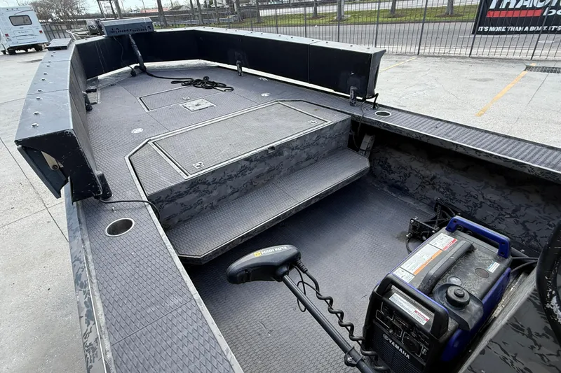 Slide: The Image of 2018 Gator Tail Extreme Series 2060cc boat interior with equipment and storage compartments. - 8